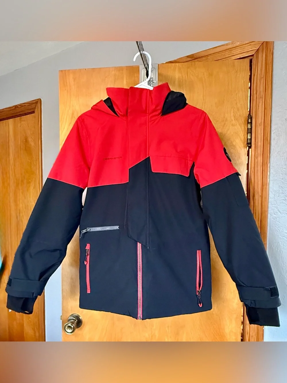 Obermeyer Boys' Axel Insulated Jacket in the colorway Brakelight (Red/Black)
